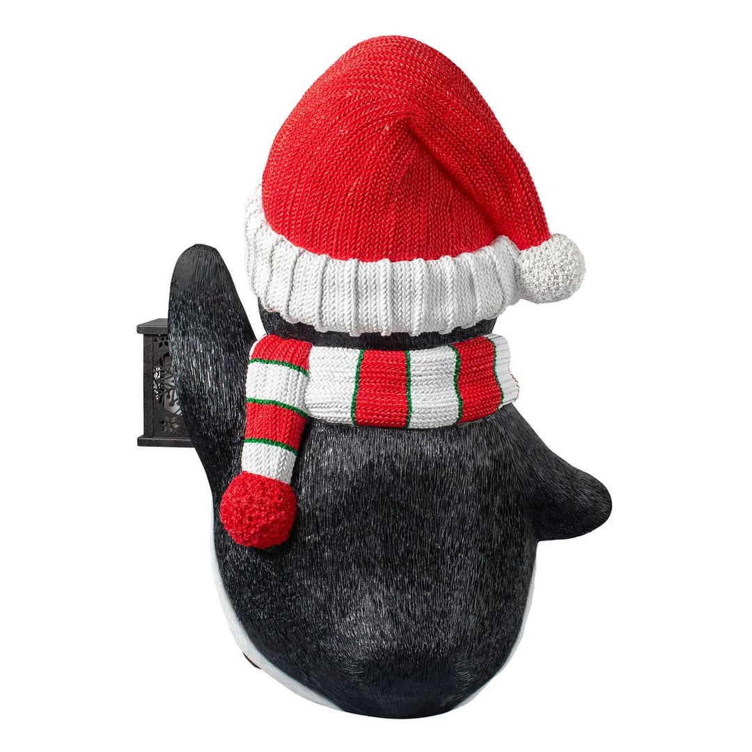 Pingouin ornemental de Noël avec lanterne